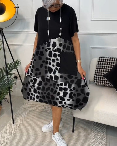 Anora – Elegant Boho Midikjole med Print